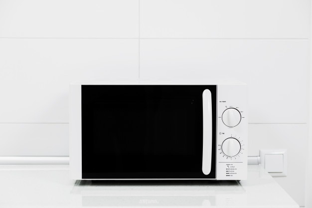 White microwave oven Premium Photo
