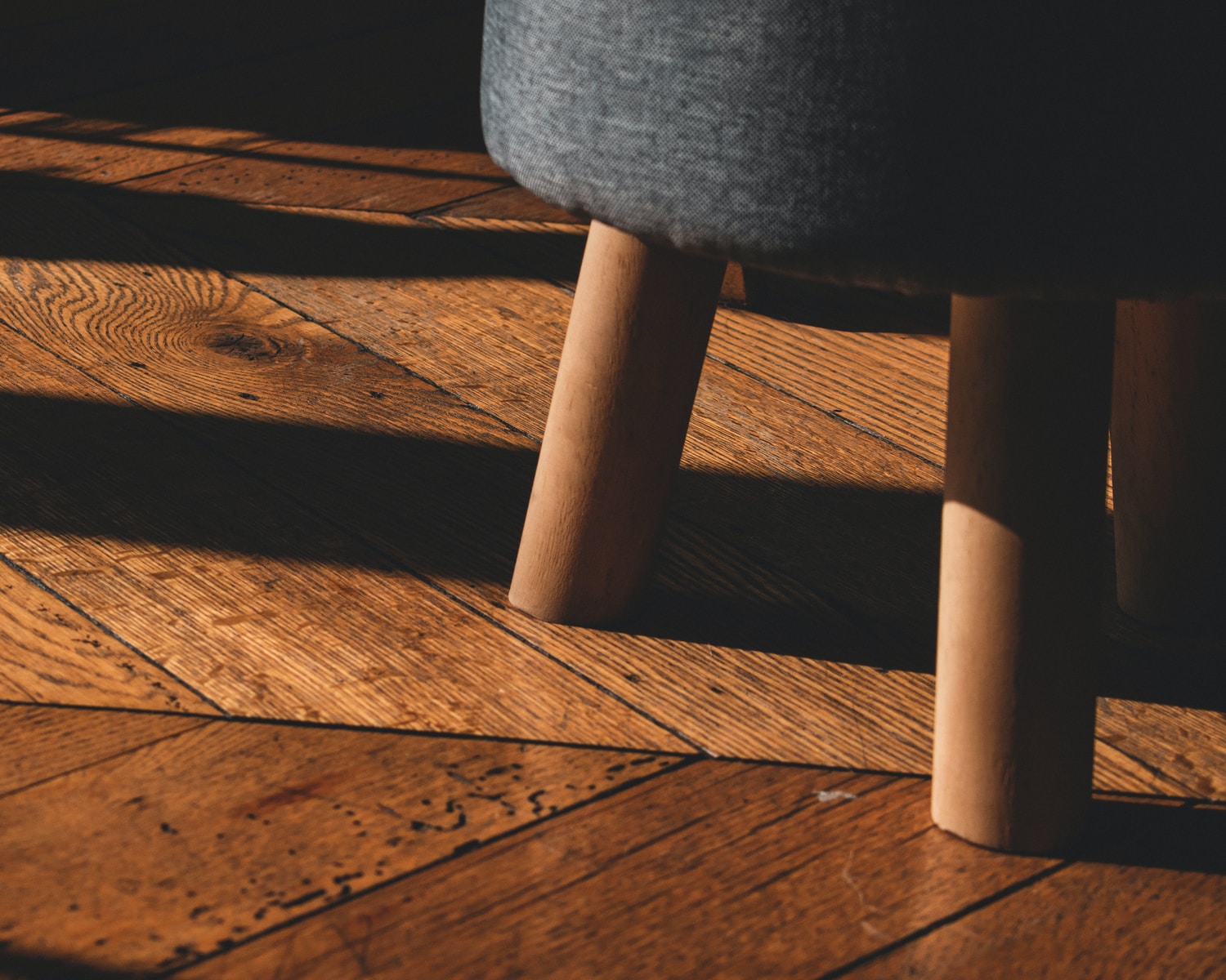Why You Must Choose Engineered Wood Flooring for Your Home black round seat on brown wooden floor