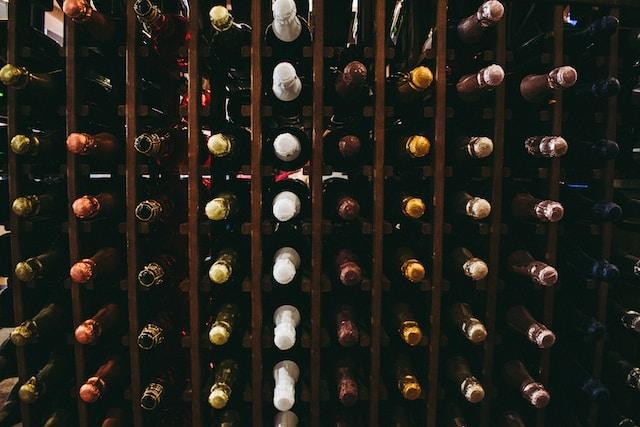 Creative DIY Wine Rack Ideas for Small Kitchens A picture containing soft drink, wine rack, bottle, wine cellar Description automatically generated