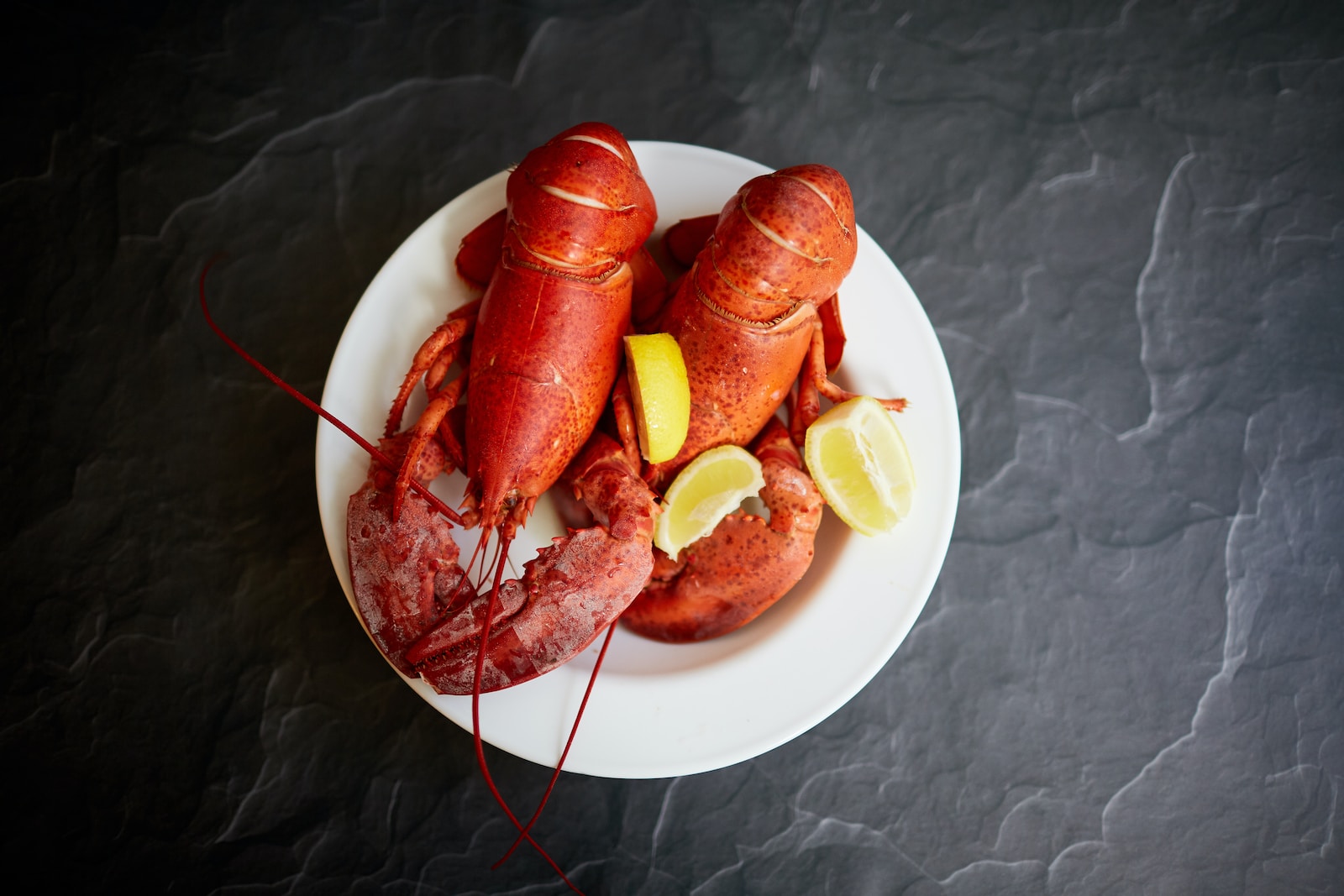 Fresh Lobster Delivery: Indulge in the Finest Seafood Delivered to Your Doorstep red lobster on white ceramic plate