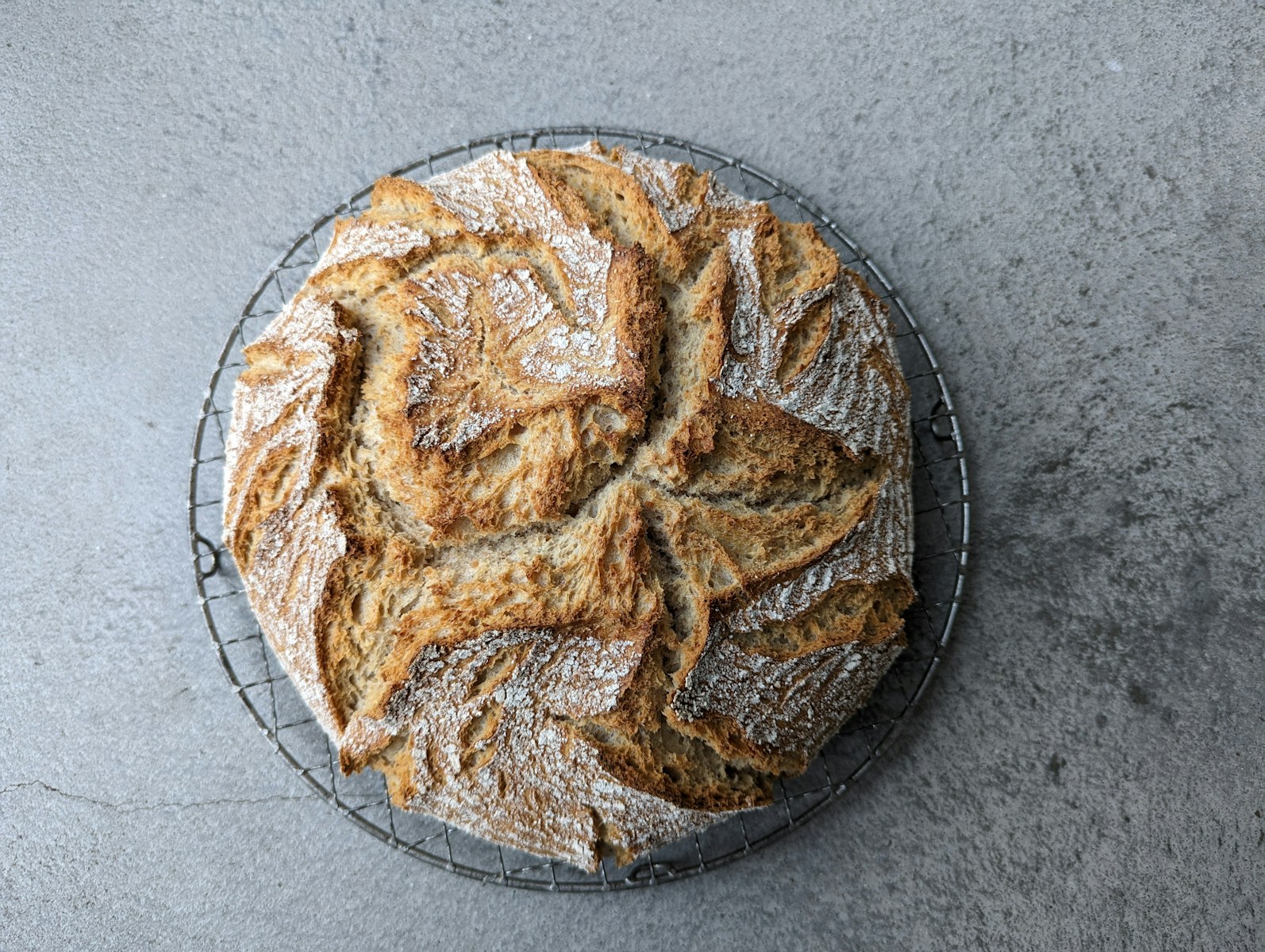 a loaf of bread sitting on top of a wire rack