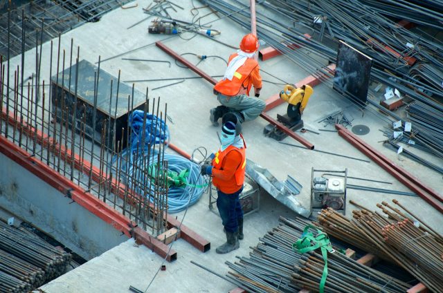4 Ways a Job in the Trades Beats a Profession two men working