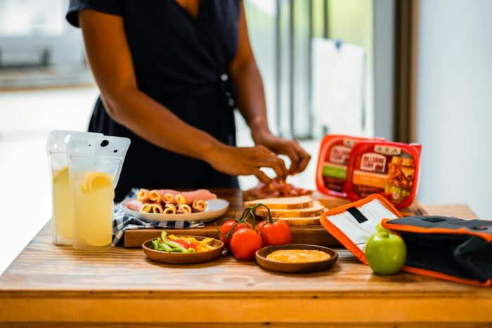 Cooking at Home vs. Eating Out: Letting AI Run the Real Monthly Numbers man in black polo shirt standing beside table with food